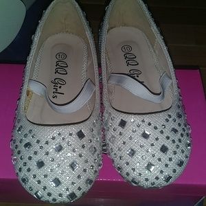 Beautiful girls shoes with stones.